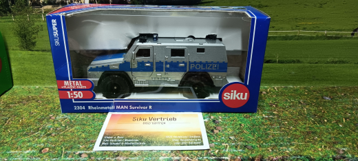 2305-Rheinmetall MAN Survivor R,neu in OVP