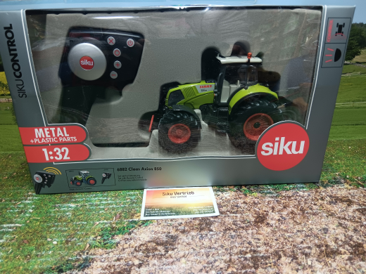 6882 - Claas Axion 850 - Set mit Fernsteuerung,1:32,neu in OVP