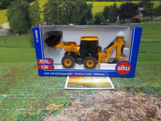 3558 - JCB 4CX Baggerlader,1:50,neu in OVP