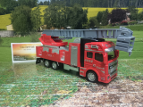 Spielauto Feuerwehr-LKW mit Drehleiter rot/grau 21cm Metall Kartonetui