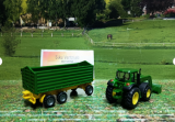 1843 - John Deere mit Frontlader und Anhänger,1:87,neu in OVP