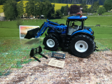 6727 - New Holland T7.315 mit Frontlader und App Steuerung