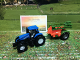 1668 - New Holland mit Feldspritze