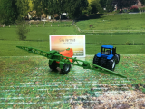 1668 - New Holland mit Feldspritze