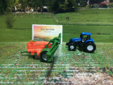 1668 - New Holland mit Feldspritze