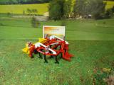 2067 - Pöttinger Grubber,1:32,neu in OVP