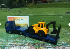 1761- MAN Lkw mit Baggerlader, Neuheit 2/25,neu in OVP