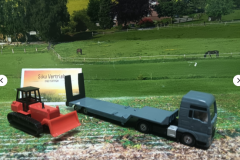 1762- MAN Lkw mit Planierraupe, Neuheit 2/25, neu in OVP