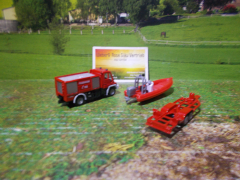 1636 - Unimog Feuerwehr mit Boot,Siku Blister,neu in OVP