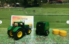 1665 - John Deere Traktor m. Ballenpresse und 2 Ballen,siku Blister,neu in OVP