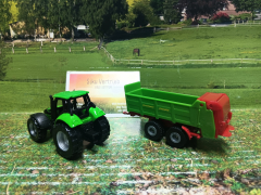 1673 - Deutz mit Universalstreuer,Siku Blister,neu in OVP